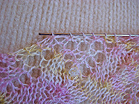 feeding the wire through the top of the shawl